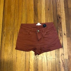 Rust colored shorts with pockets